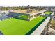 Elevated view of a commercial building with a green roof and a full parking lot at 5700 S Quebec St # A, Englewood, CO 80111