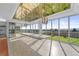 Sunlit dining space featuring floor-to-ceiling windows, a sleek table, and stylish chandeliers at 5700 S Quebec St # A, Englewood, CO 80111