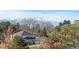 Charming home with an attached two car garage set amongst lush greenery with a stunning mountain backdrop at 5700 S Quebec St # A, Englewood, CO 80111