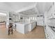 Bright and open kitchen with custom cabinets and large island perfect for entertaining guests at 5700 S Quebec St # A, Englewood, CO 80111