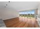 Inviting living room with hardwood floors and large windows that offer a view at 5700 S Quebec St # A, Englewood, CO 80111