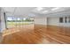 Open living space featuring floor to ceiling windows offering panoramic views, and a unique skylight at 5700 S Quebec St # A, Englewood, CO 80111