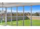 Bright living space with floor-to-ceiling windows and views of lush landscaping at 5700 S Quebec St # A, Englewood, CO 80111