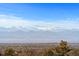 Mountain views through the trees at 5700 S Quebec St # A, Englewood, CO 80111