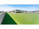 Expansive rooftop patio features artificial turf, a solarium, and city views at 5700 S Quebec St # A, Englewood, CO 80111