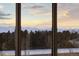 Beautiful mountain view through a large picture window at sunset at 5700 S Quebec St # A, Englewood, CO 80111
