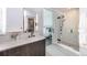 Elegant bathroom with a glass shower and sleek vanity at 1901 Wazee St # 1020, Denver, CO 80202