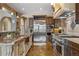 Spacious kitchen featuring stainless steel appliances and custom cabinets at 8417 High Ridge Ct, Castle Pines, CO 80108
