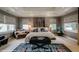 Serene main bedroom with a fireplace, large bed, soft lighting, and decorative accents for a luxurious retreat at 460 Garfield St, Denver, CO 80206