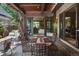 Inviting outdoor patio space featuring a dining table and chairs, with a covered area and open access to the home at 460 Garfield St, Denver, CO 80206