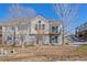 Backyard with brick and stone accents and manicured landscaping at 7879 S Zante Ct, Aurora, CO 80016