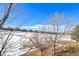 Backyard view of neighboring houses from the home's lot at 7879 S Zante Ct, Aurora, CO 80016