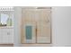 Glass shower enclosure with a towel rack at 7879 S Zante Ct, Aurora, CO 80016