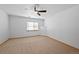 Bright and airy bedroom with ceiling fan and window at 7879 S Zante Ct, Aurora, CO 80016