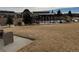 A beautiful community pool awaits, fenced in, nestled into the surrounding landscaping at 7879 S Zante Ct, Aurora, CO 80016