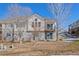 Two-story townhome with stone and siding exterior at 7879 S Zante Ct, Aurora, CO 80016