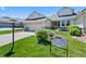 Charming single-Gathering home with a well-maintained lawn and a two-car garage, located in a friendly neighborhood at 7879 S Zante Ct, Aurora, CO 80016