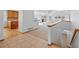 Bright living room showcasing an open floor plan, fireplace, and large windows for lots of natural light at 7879 S Zante Ct, Aurora, CO 80016