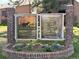 Attractive Bear Valley Club sign at entrance, showing building map and community information at 3613 S Sheridan Blvd # 16, Denver, CO 80235