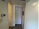Hallway with gray wood-look flooring at 3613 S Sheridan Blvd # 16, Denver, CO 80235