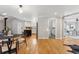 Bright dining area with hardwood floors and modern table at 3341 W Belmont Ave, Littleton, CO 80123