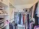 Walk-in closet providing ample storage space with shelving and hanging racks at 6426 Silver Mesa Dr # C, Highlands Ranch, CO 80130