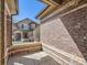 Brick patio with a view of a neighboring house at 6426 Silver Mesa Dr # C, Highlands Ranch, CO 80130