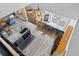 Birds-eye view of the kitchen featuring granite countertops, modern lighting, stainless steel appliances, and custom cabinetry at 402 S County Road 129, Bennett, CO 80102