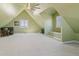 Spacious bonus room with vaulted ceiling and carpet at 402 S County Road 129, Bennett, CO 80102