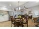 Kitchen with breakfast nook and view into the adjacent living room at 402 S County Road 129, Bennett, CO 80102