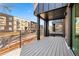 Private deck overlooking a residential street at 1256 Newton St # 1, Denver, CO 80204