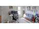 Comfortable home office featuring a modern desk, ergonomic chair, and a cozy sofa at 8917 E Chenango Ave, Greenwood Village, CO 80111
