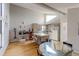 Bright, open kitchen with a central island, modern appliances, and ample counter space at 8917 E Chenango Ave, Greenwood Village, CO 80111
