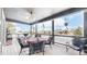 Spacious back deck with outdoor dining set and neighborhood views at 14994 Fillmore Way, Thornton, CO 80602