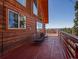 Inviting deck features comfortable seating and breathtaking mountain views, perfect for relaxing and entertaining at 451 Harris Dr, Idaho Springs, CO 80452