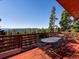 Breathtaking mountain views from this spacious deck, ideal for outdoor dining and peaceful relaxation at 451 Harris Dr, Idaho Springs, CO 80452