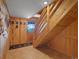 Wood paneled entryway with tile floors and stairs at 451 Harris Dr, Idaho Springs, CO 80452