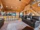 Open-concept living area with an island and scenic mountain views at 451 Harris Dr, Idaho Springs, CO 80452