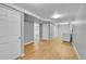 Finished basement with wood floors, utility area and large storage closets at 505 Empire St, Aurora, CO 80010