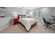 Serene bedroom offering a relaxing retreat with ample natural light and comfortable furnishings at 7050 S Polo Ridge Dr, Littleton, CO 80128
