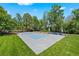 An outdoor pickleball court offers a recreational area for the Gathering to enjoy outdoor games and sports at 7050 S Polo Ridge Dr, Littleton, CO 80128