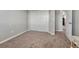 Neutral bedroom featuring carpet and sliding closet doors at 145 Kettle Valley Way, Monument, CO 80132
