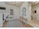 Bright foyer with hardwood floors and a unique wooden bench at 145 Kettle Valley Way, Monument, CO 80132