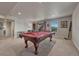 Game room featuring a pool table and a walkout to the patio at 145 Kettle Valley Way, Monument, CO 80132