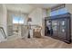 Loft area with views, carpet, display case, and wicker chair at 145 Kettle Valley Way, Monument, CO 80132