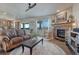 Open living area with fireplace and views at 145 Kettle Valley Way, Monument, CO 80132