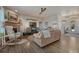 Inviting living room featuring a cozy fireplace and ample seating at 145 Kettle Valley Way, Monument, CO 80132