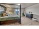 Tranquil main bedroom with a four-poster bed and decorative accents at 145 Kettle Valley Way, Monument, CO 80132