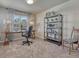 Home office featuring a desk and rolling chair in front of a window and a decorative shelf unit at 145 Kettle Valley Way, Monument, CO 80132