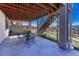 Backyard patio with outdoor seating and views of the lush landscaping at 145 Kettle Valley Way, Monument, CO 80132